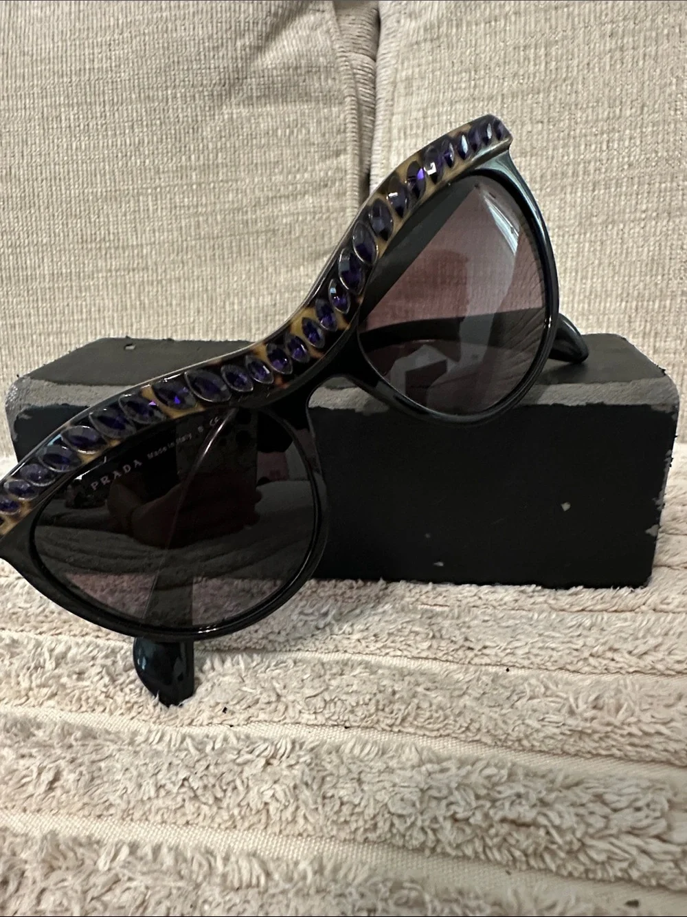 Prada Black Cat-Eye Sunglasses with Purple Crystal Trim